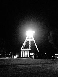 Illuminated street light at night