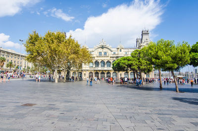 Group of people in front of historical building