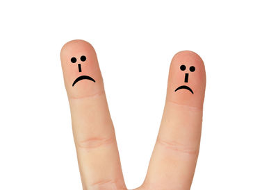 Close-up of human hand against white background