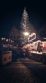 Illuminated street light at night