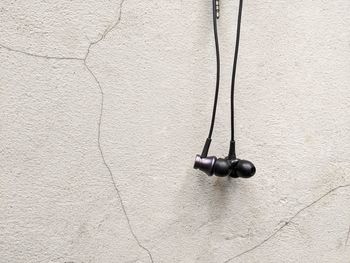 Close-up of electric light on wall