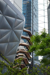 Low angle view of modern buildings in city