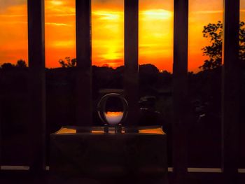 Sunset seen through glass window