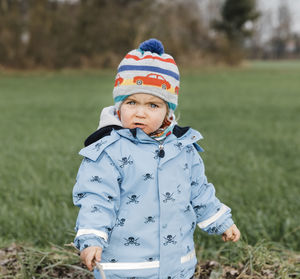 Girl standing on field