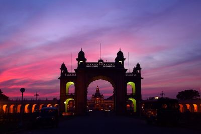 View of illuminated building against sky