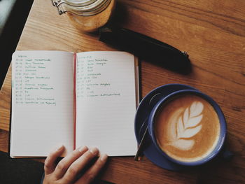 High angle view of coffee cup on table