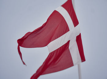 Low angle view of flag against the sky