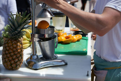 Midsection of man preparing food