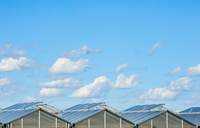 Low angle view of houses against sky