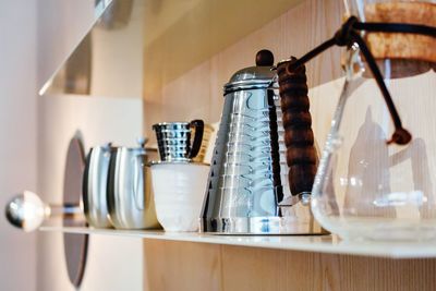 Close-up of kitchen utensils on table