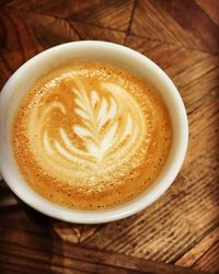 High angle view of cappuccino on table