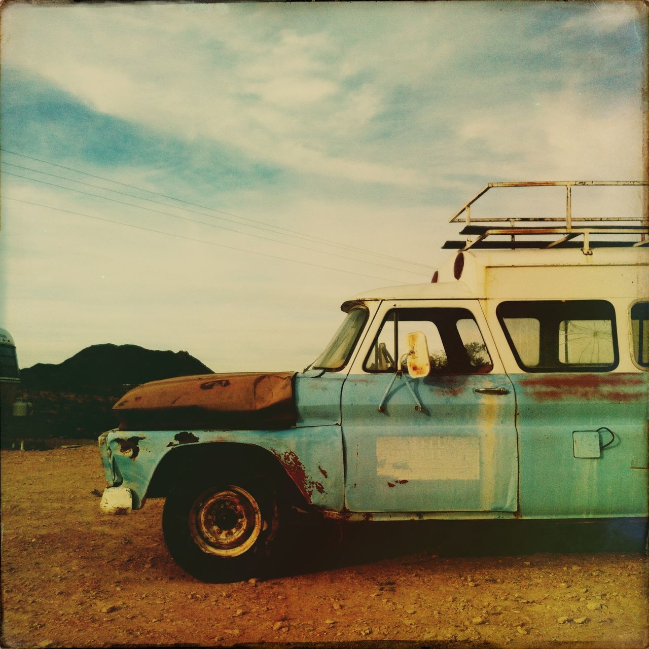 transportation, mode of transport, land vehicle, sky, car, cloud - sky, stationary, building exterior, cloud, no people, outdoors, built structure, parked, day, abandoned, architecture, field, auto post production filter, old-fashioned, house