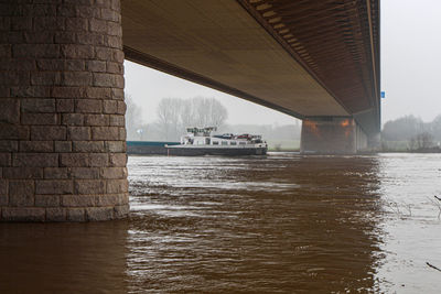 Bridge over river against sky