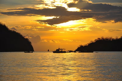 Scenic view of sea at sunset