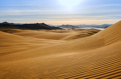 Scenic view of desert against sky