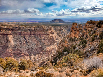 Aerial view of grand canyon against cloudy sky