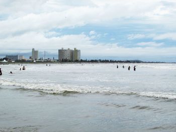 Scenic view of beach against sky