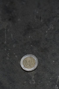 Close-up of coin on floor