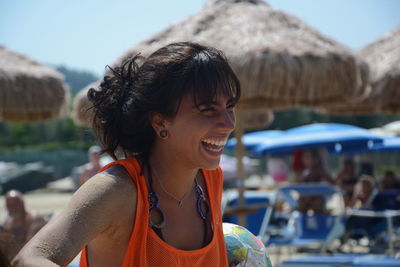 Laughing woman at beach
