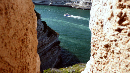 High angle view of sea and rocks