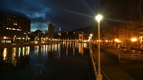 Illuminated street light at night
