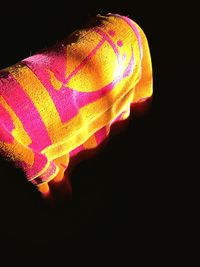 Close-up of illuminated lights at night