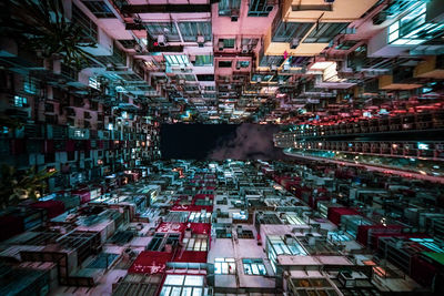 Digital composite image of illuminated buildings in city at night