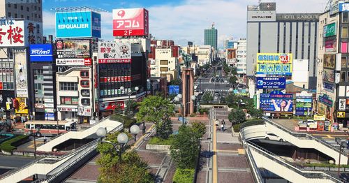 High angle view of street amidst buildings in city