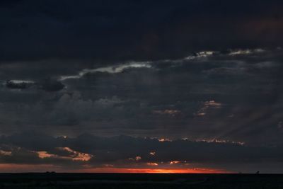 Low angle view of dramatic sky during sunset