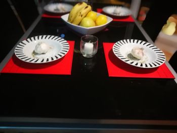 High angle view of clock on table