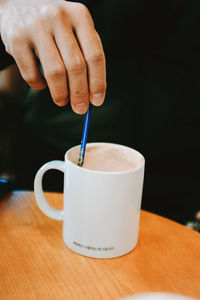 Close-up of coffee cup on table