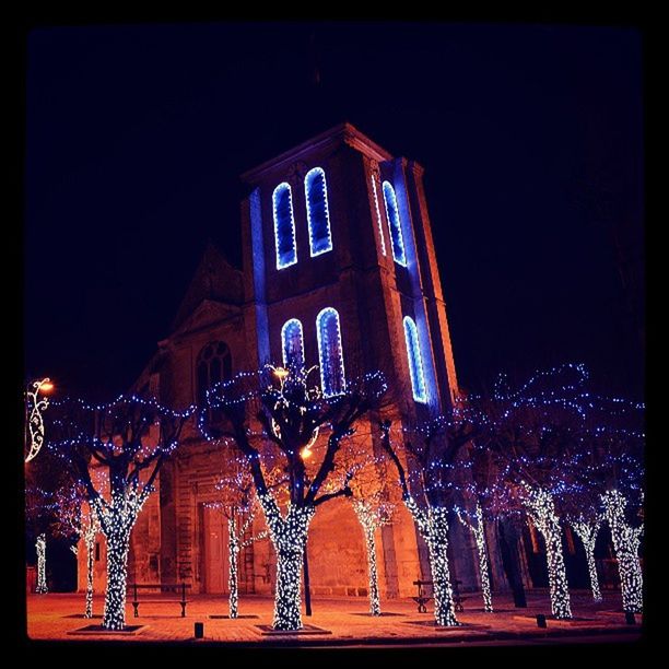 night, illuminated, building exterior, architecture, built structure, transfer print, auto post production filter, religion, clear sky, low angle view, place of worship, city, spirituality, church, outdoors, lighting equipment, facade, no people, arts culture and entertainment