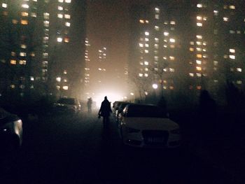 People in city at night