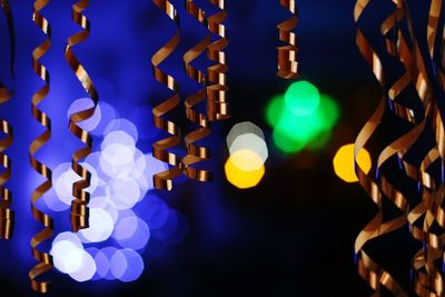 Close-up of illuminated lighting equipment