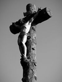 Low angle view of statue against sky