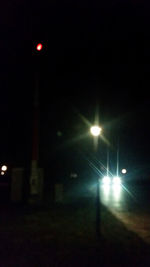 View of illuminated street light at night