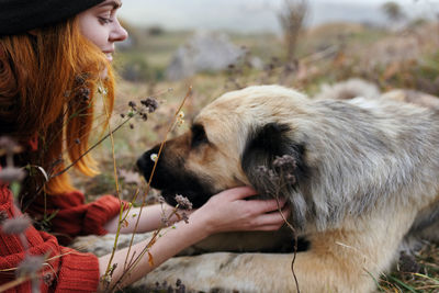 Close-up of woman with dog