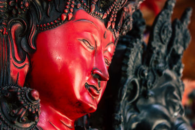 Close-up of buddha statue in temple