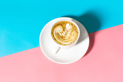 High angle view of cappuccino on table