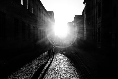 Man walking on street in city