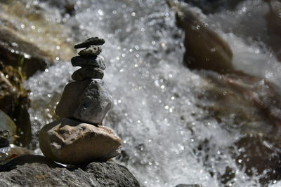 Close-up of stone stack on rock