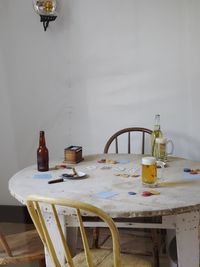 View of wine bottles on table at home