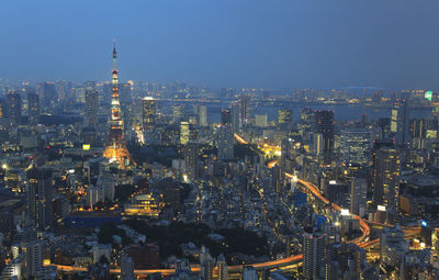 Aerial view of illuminated cityscape at night