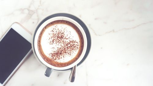 High angle view of coffee on table