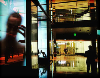 People walking in modern building