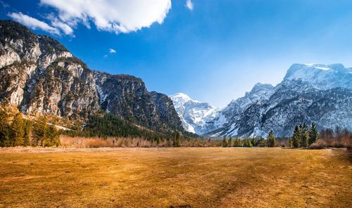 Scenic view of snowcapped mountains against sky