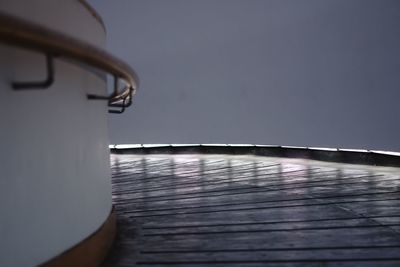 High angle view of wooden table against wall