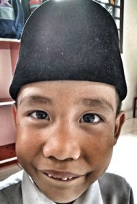 Close-up portrait of smiling boy