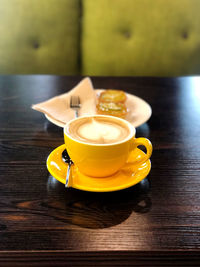 Close-up of coffee cup on table