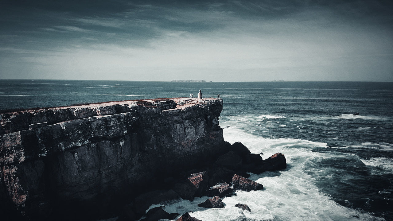 sea, water, sky, horizon over water, horizon, scenics - nature, rock, land, beauty in nature, solid, rock - object, beach, nature, day, tranquil scene, tranquility, wave, motion, rock formation, no people, outdoors, rocky coastline, breaking